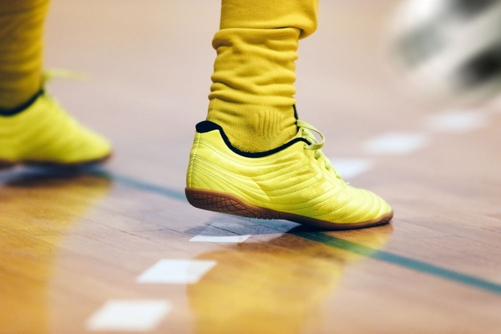 choose the right shoes on hardwood surface for indoor soccer
