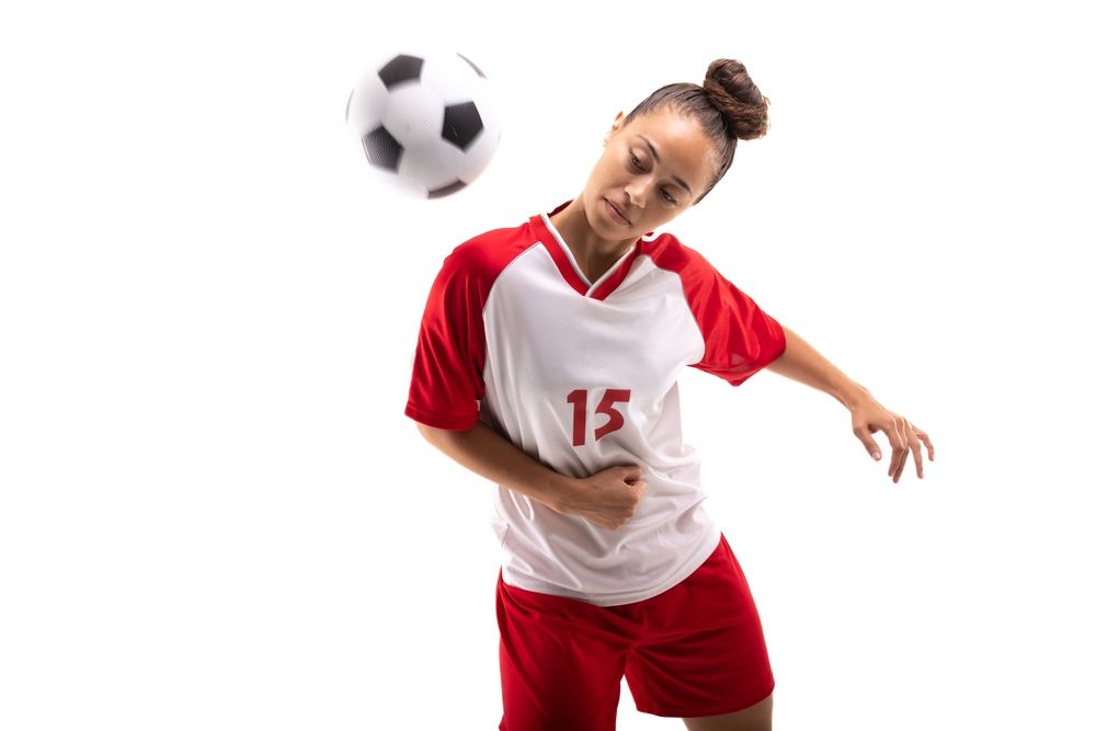 Women player use her shoulder to pass the ball