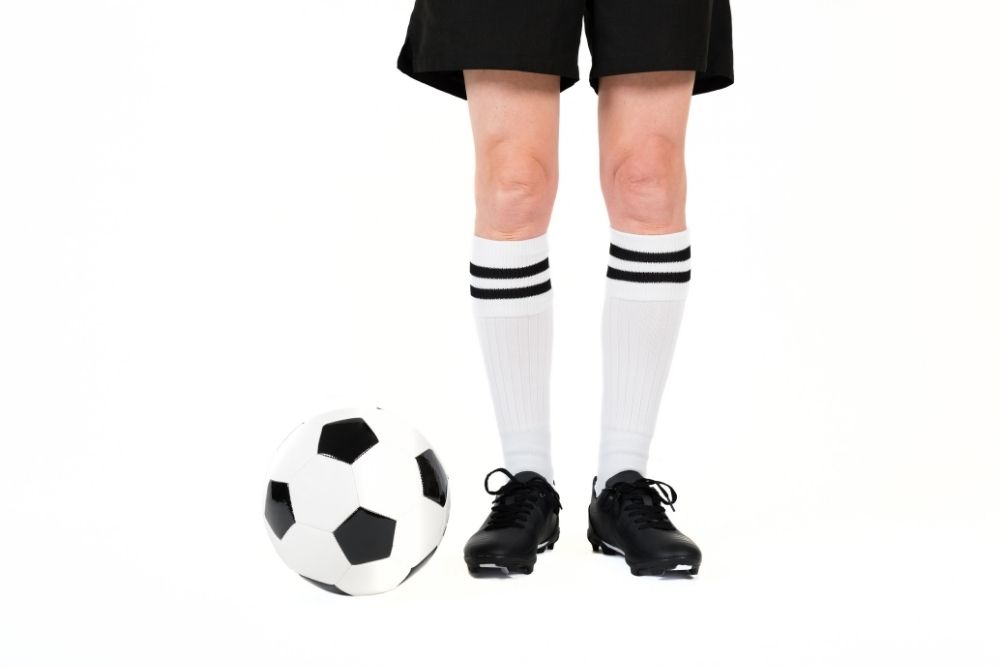 soccer player with skinny legs