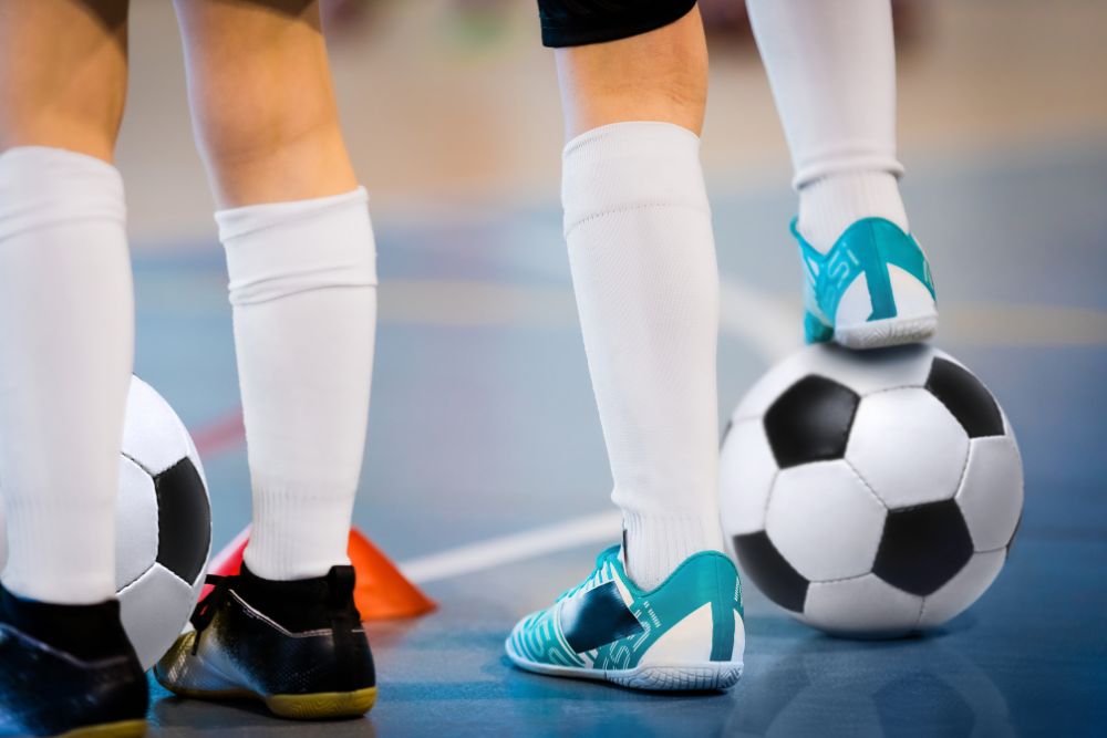 Soccer player in the indoor soccer game