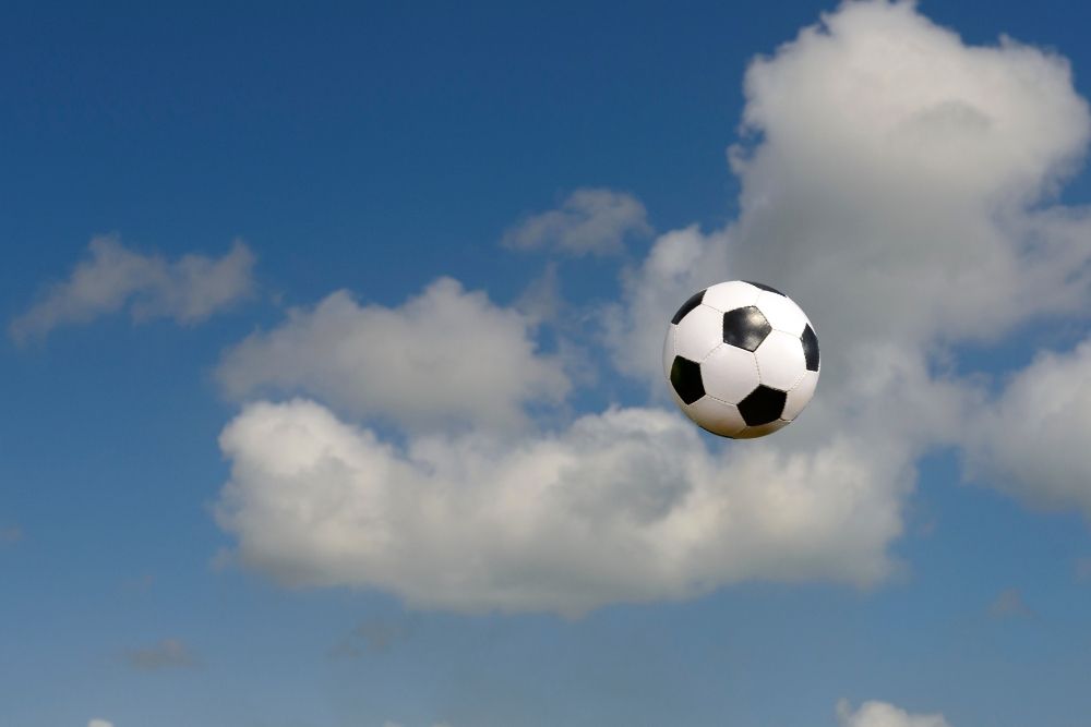 a soccer ball is flying in the air