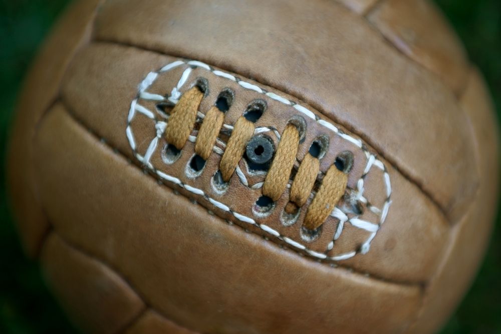an ancient soccer ball with a valve