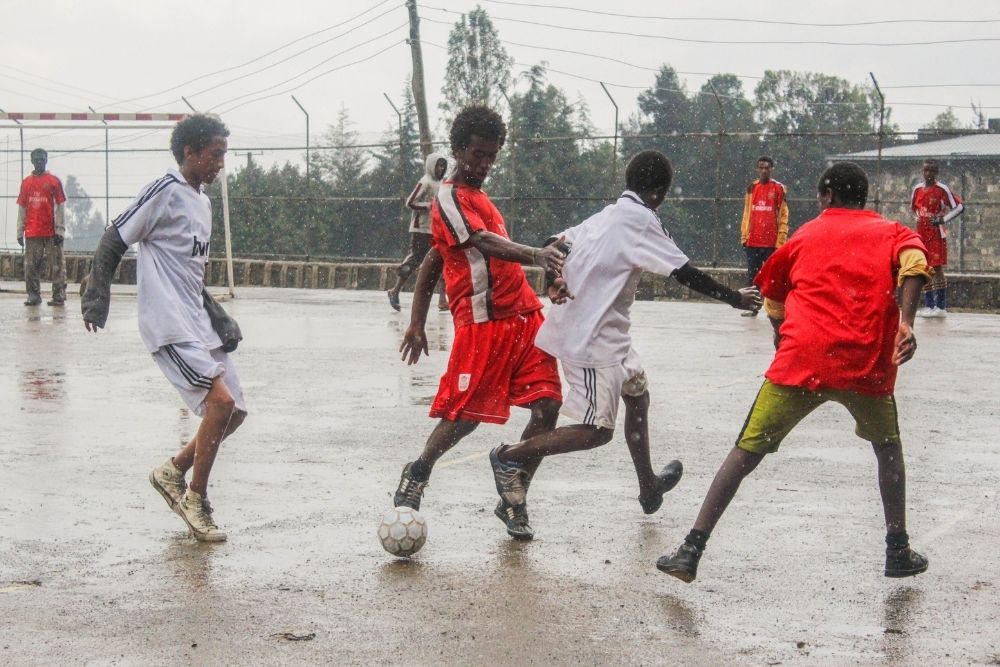 a soccer match in rain