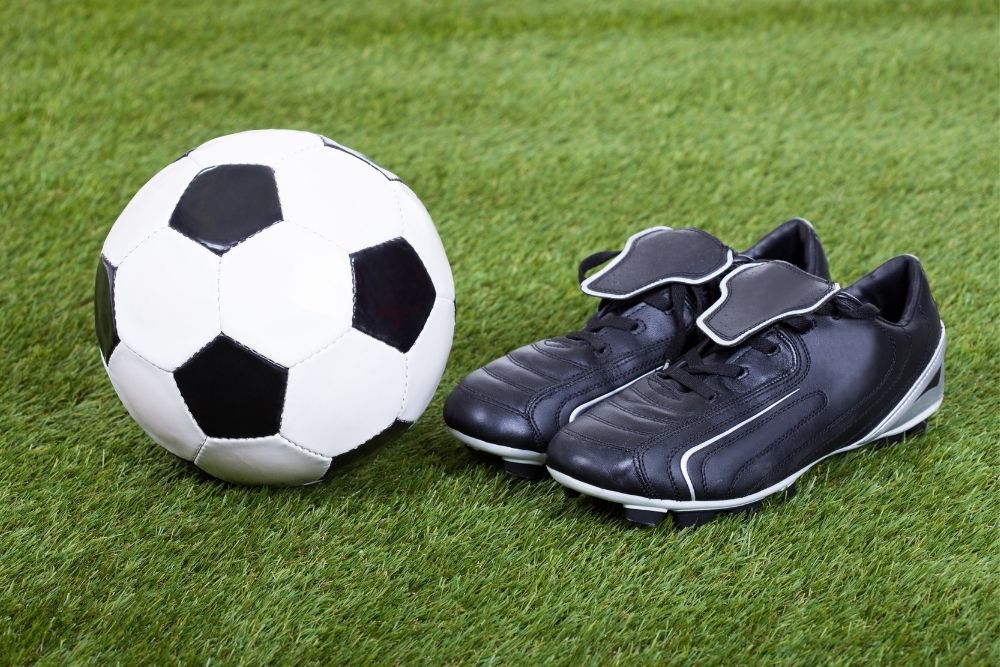 soccer cleats on the pitch