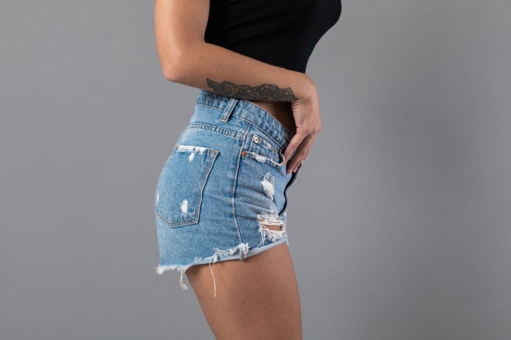 woman wearing jean shorts