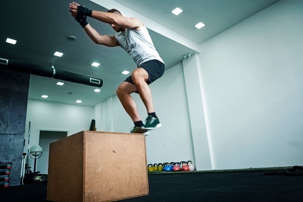 A man is taking The Box Jump Exercise