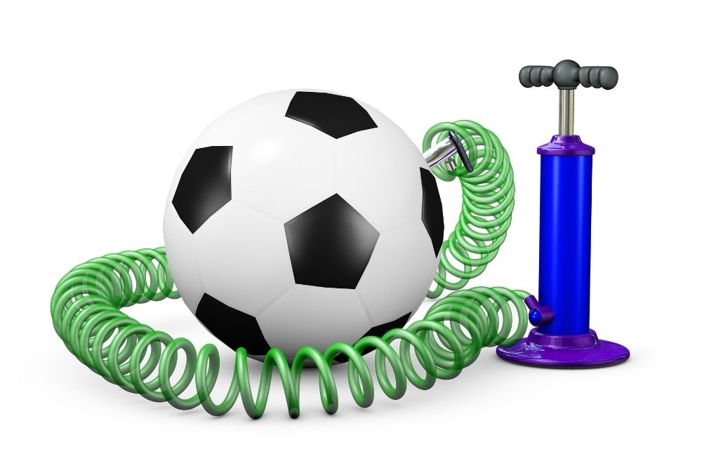 A soccer ball and a Pump