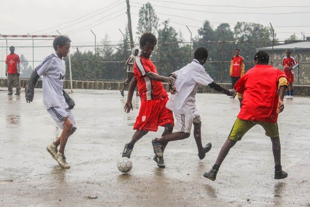 A soccer match in the rain