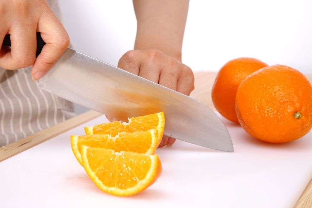 Cut orange into wedge slice