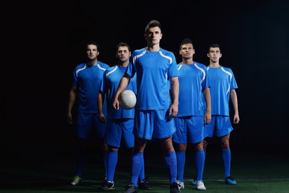 a soccer team wearing blue