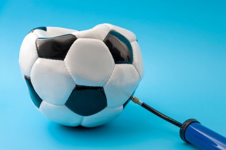 deflate a soccer ball