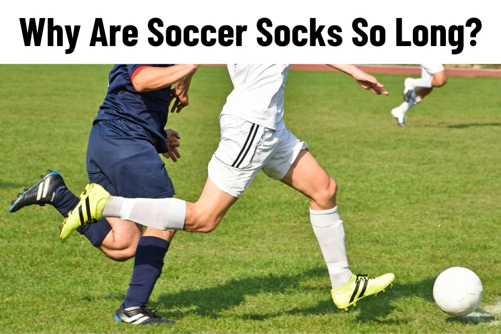 two soccer players wearing long socks run for a ball