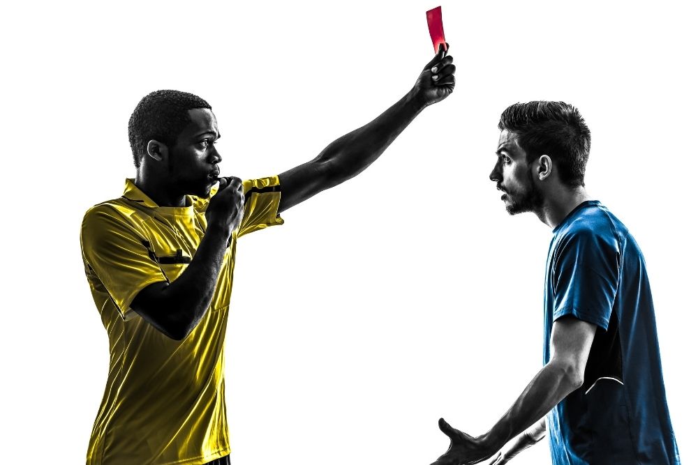 Soccer player get red card