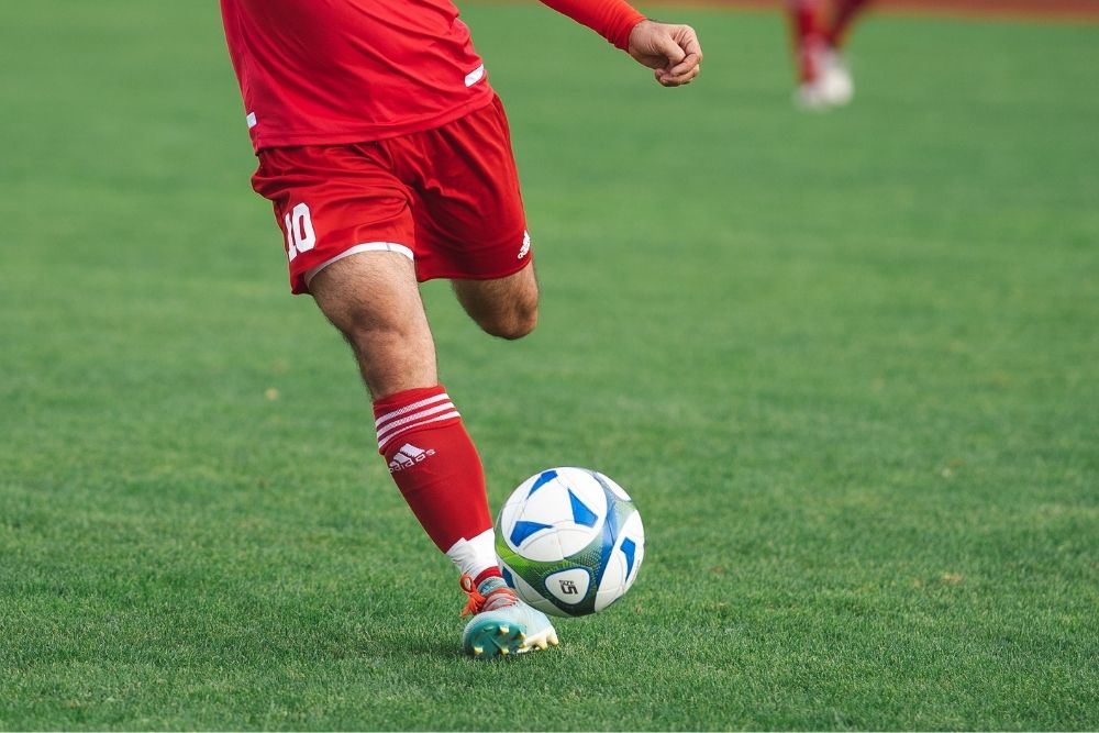 Soccer player shoot the ball