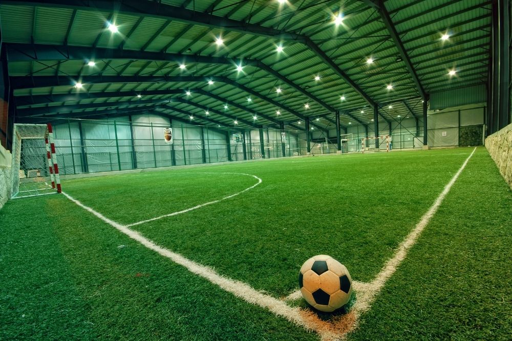 a ball at the corner of the pitch indoor soccer