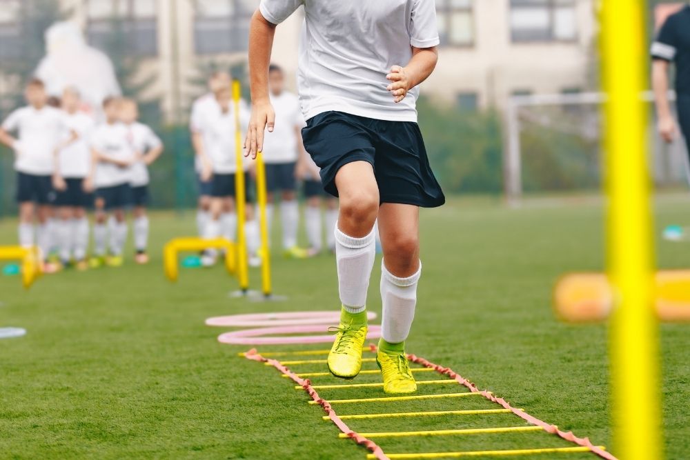 soccer training with agility ladder