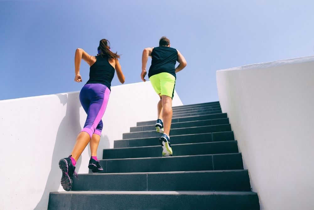 two people doing stair climbing
