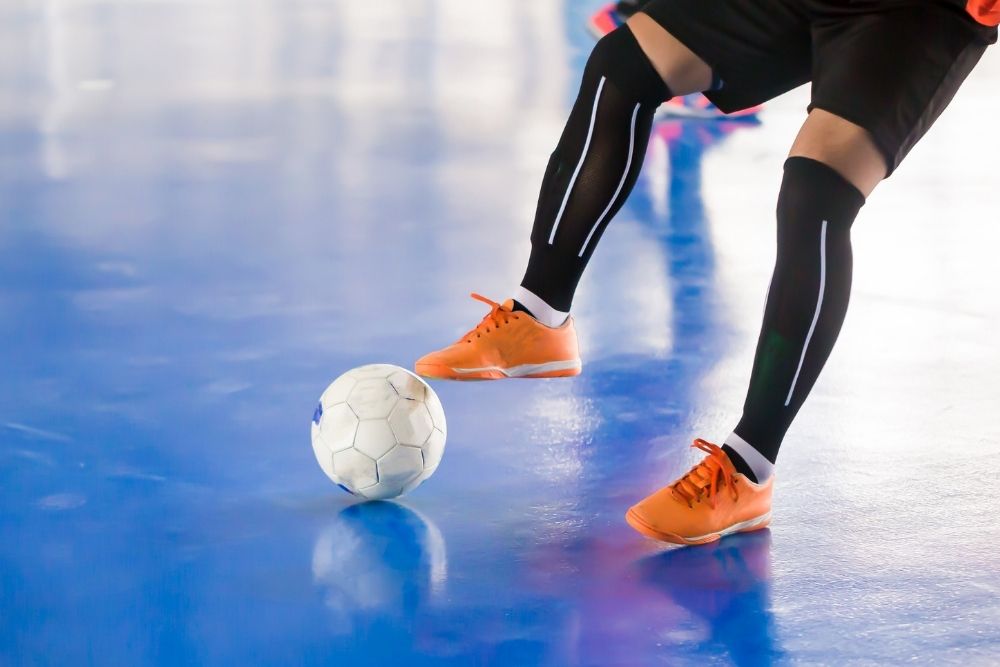Futsal player control the ball with his sole