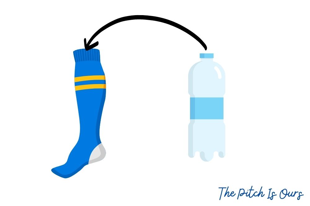 put the bottle into the soccer sock to stretch it